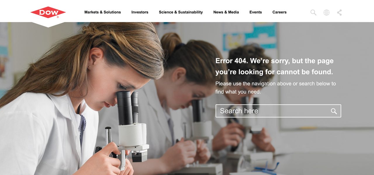 Dow.com 404 page design: a scientist at a microscope beside the message that the page cannot be found, with a search field below
